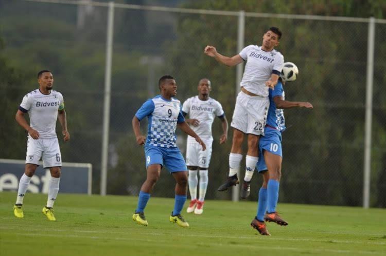 Anthony Gordinho of Bidvest Wits and Ratovonirina Branly of Pamplemousses during the CAF Champions League match between Bidvest Wits and Pamplemousses at Bidvest Stadium on February 10, 2018 in Johannesburg.