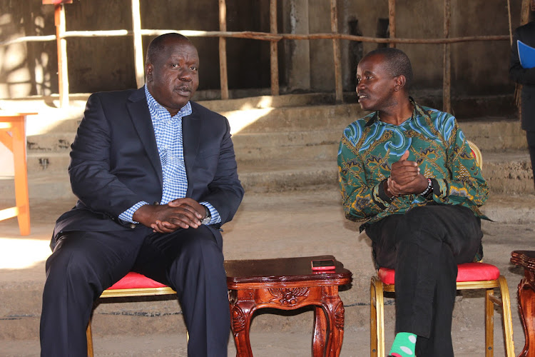 Interior CS Fred Matiang'i and his ICT counterpart Joe Mucheru at ACK Kenol cathedral in Murang'a on June 3, 2022.