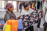 The Taking Care of Business resell initiative focuses on reselling donated clothes and uplifting unemployed mothers. 