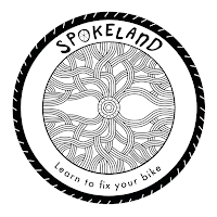 Spokeland logo with "Learn to fix your bike"