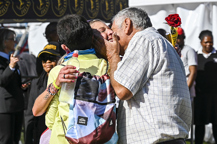 Gerda Steyn is greeted by her parents on winning the 2023 Comrades women's race.