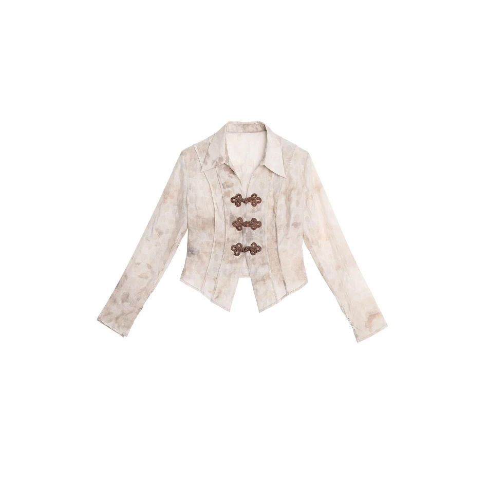 Top ajusté pour femme avec boucle design. Un haut élégant et flatteur pour toutes les occasions. Mettez votre silhouette en valeur avec style.