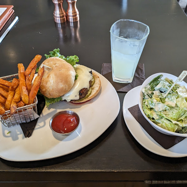 Cheeseburger, sweet potato fries, caeser salad, lemomade