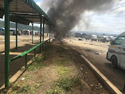 Taxi drivers barricaded roads into and out of Pietermaritzburg, leaving residents stranded. 