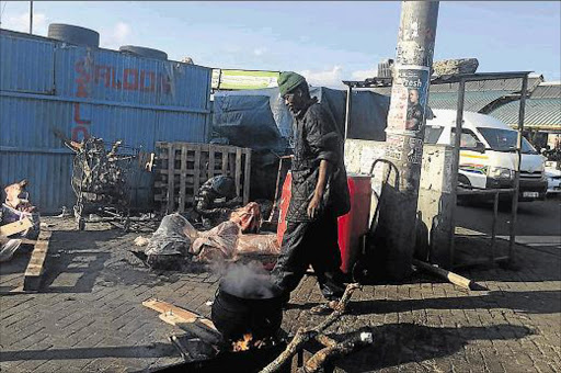 AUGUST 16, 2016.FORCED TO MOVE: Angry hawkers from the Mdantsane CBD have expressed unhappiness about the news that Buffalo City Metro will remove them from the busy Sandile Road to make way for a multi-million rand development project in Highway CBD.Picture: MAMELA GOWA