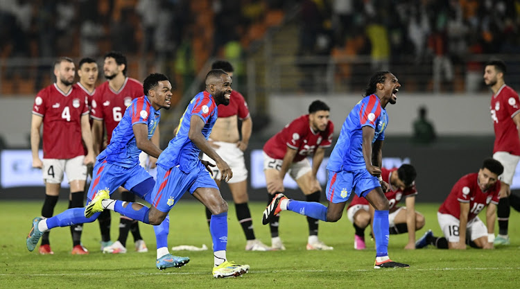 Democratic Republic of Congo players celebrate their penalty shootout victory in the 2023 Africa Cup of Nations last 16 match against Egypt at Stade Laurent Pokou in San Pedro, Ivory Coast on Sunday.