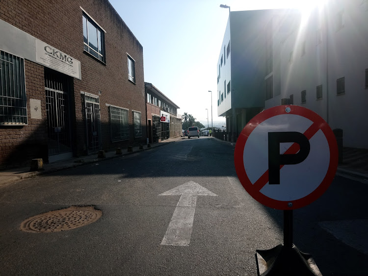 A large contingent of police cordoned off Court Road at the Verulam Family Court, preventing the public, court officials and journalists from entering.