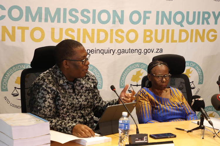 Gauteng premier , Panyaza Lesufi and Justice Sisi Khampepe during the officially hand over of the Usindiso Building Commission of Inquiry in Midrand , Johannesburg.