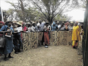 IN DISPUTE:   Supporters of Lehlomela Lion in the chieftaincy battle of Maboloka village arrived at the court colourfully dressed in their Basotho attire Photo: Boitumelo Tshehle