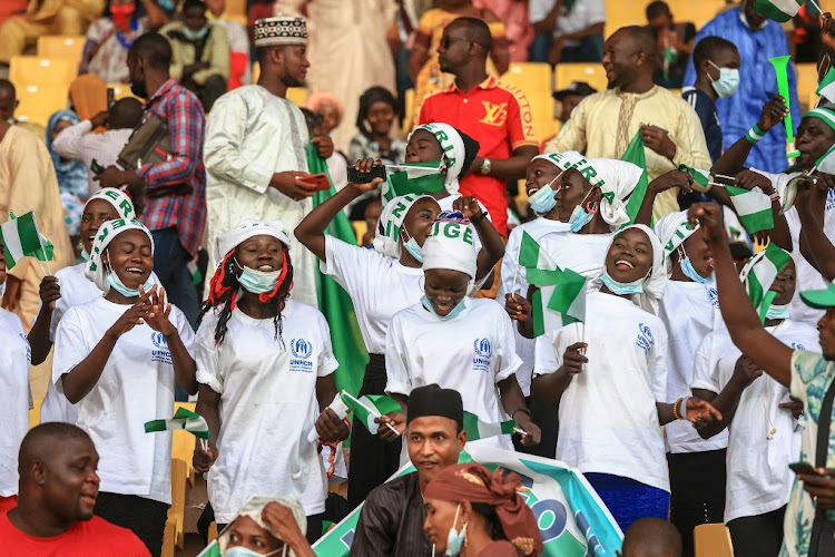 Players from the women's football team in the Minawao refugee camp attend an Africa Cup of Nations match between Nigeria and Sudan in Garoua on January 15