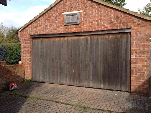 Replace double timber up  Over for automated roller door in brown