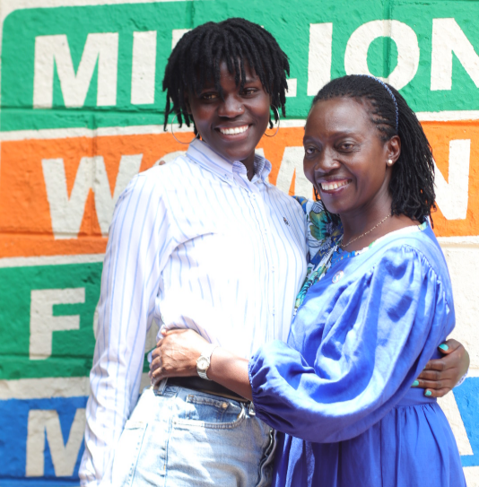 Azimio presidential running mate Martha Karua with a member of her campaign secretariat.