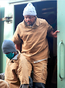 Zimbabwean journalist Hopewell Chin'ono, who was arrested last month for supporting anti-government protests, arrives at court in Harare on August 7 2020. 