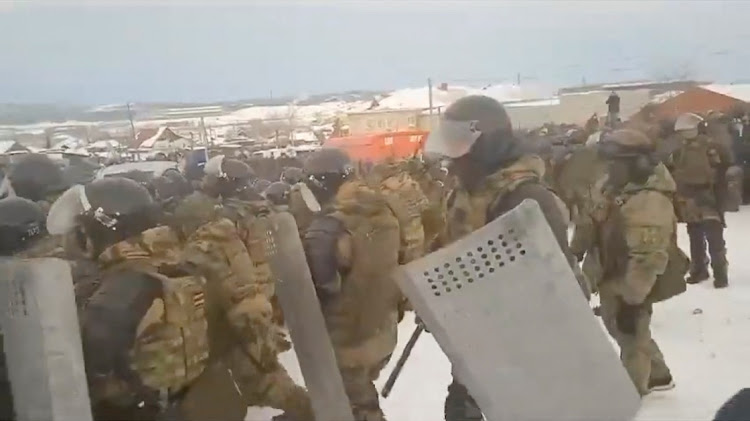 Riot police disperse protesters rallying in support of activist Fail Alsynov, near a court building in Baymak in the Republic of Bashkortostan, Russia, January 17 2024. Picture: RUSNEWS/SOCIAL MEDIA/REUTERS