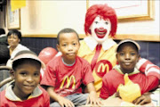 READY FOR ACTION: Three of KZN's player escort winners for the 2009 FIFA Confederations Cup are (from left) Lwazi Gabela, 7, Sihle Kubheka, 9 and Kwanda Mncwabe, 9. Pic. THULI DLAMINI. circa May 2009.  © Sowetan