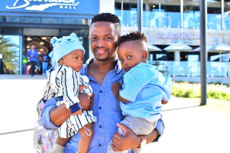 Sandile Sister, 38, with his sons, Azingce, 1, and Kungane Heleni, 3, who also died in the crash