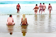 CHEEKY:  Naturists enjoy the soon-to-be officially opened nudist beach at Mpenjati on the KwaZulu-Natal South Coast Photo: JACKIE CLAUSEN