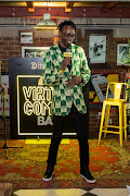 Comedian Long John on stage at the 'Savanna Virtual Comedy Bar' season 2 launch.