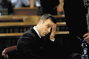 WORRIED MAN: Oscar Pistorius in the dock during his sentencing hearing at the High Court in Pretoria this week Pictures: ALON SKUY