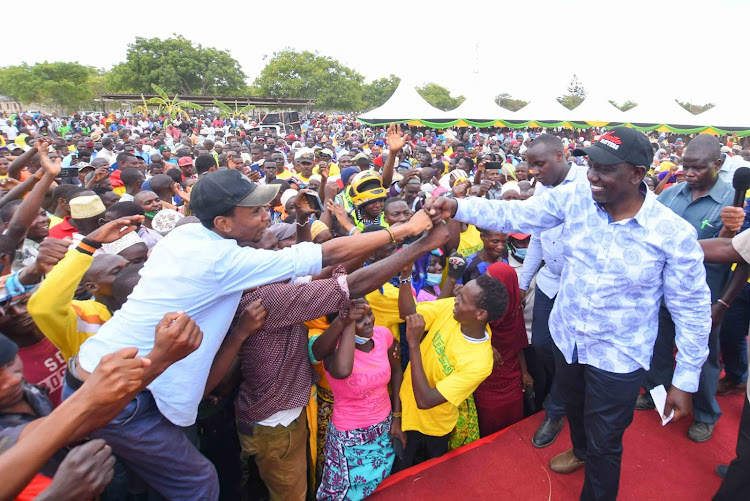 Deputy President William Ruto with locals at Kinango Boys Secondary School in Kinango, Kwale County on February 6, 2021.