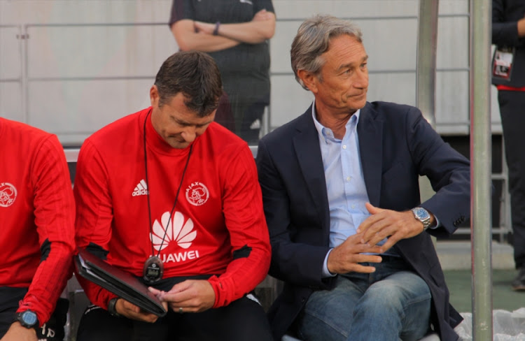 Ajax Cape Town head coach Muhsin Ertugral (R) and assistant coach Calvin Marlin (L) during the Absa Premiership match against Mamelodi Sundowns at Cape Town Stadium on January 09, 2018 in Cape Town, South Africa.