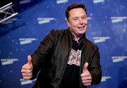 SpaceX owner and Tesla CEO Elon Musk arrives on the red carpet for the Axel Springer Award 2020 on December 1 2020 in Berlin, Germany.