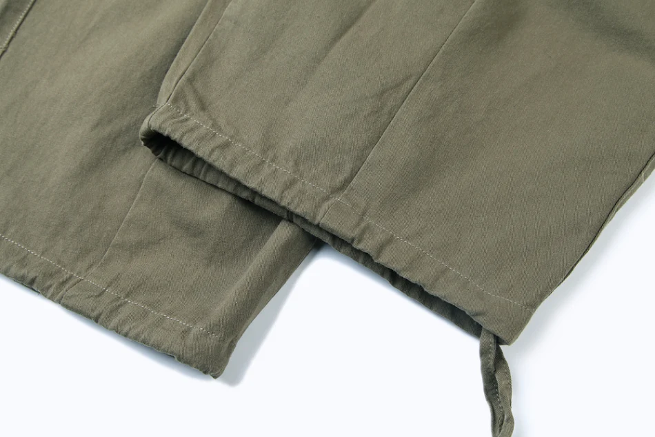 Heren overall met wijde pijpen, grote zakken en losse pasvorm. Comfortabel en stijlvol, ideaal voor een relaxte en casual look.