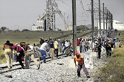 TOUGH CHALLENGE: Amcu members like these have disrupted platinum production since January.