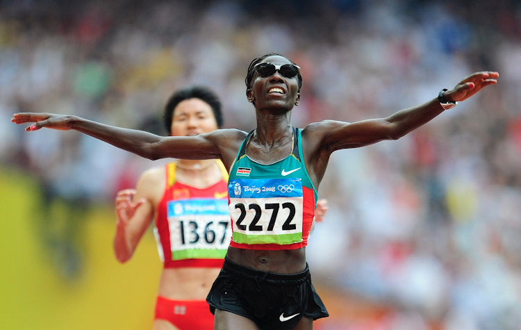 Catherine Ndereba dashes to second place in the women's marathon at the Beijing Olympics in 2008.