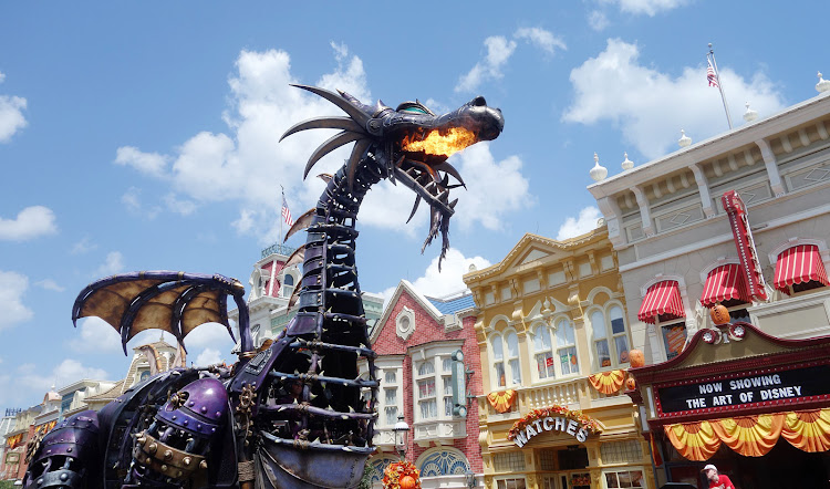 Watch out for the fire-breathing dragon during the celebratory parade at Walt Disney World.