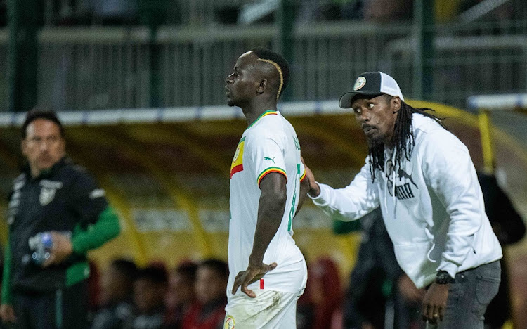 Sadio Mané takes instructions from Senegal coach Aliou Cissé. Picture: SEBAST9IAN FREJ/MB MEDIA/GETTY IMAGES