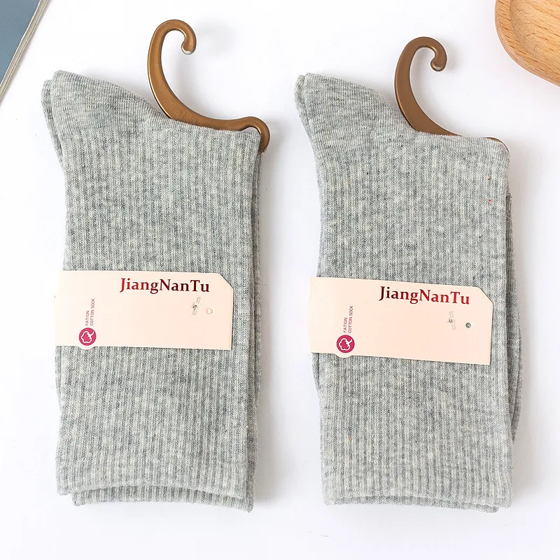 Women's Fashion Simple Solid Color Mid Tube Socks for everyday wear, offering comfort and style, versatile enough for ca