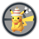 Pikachu wearing a cake hat*