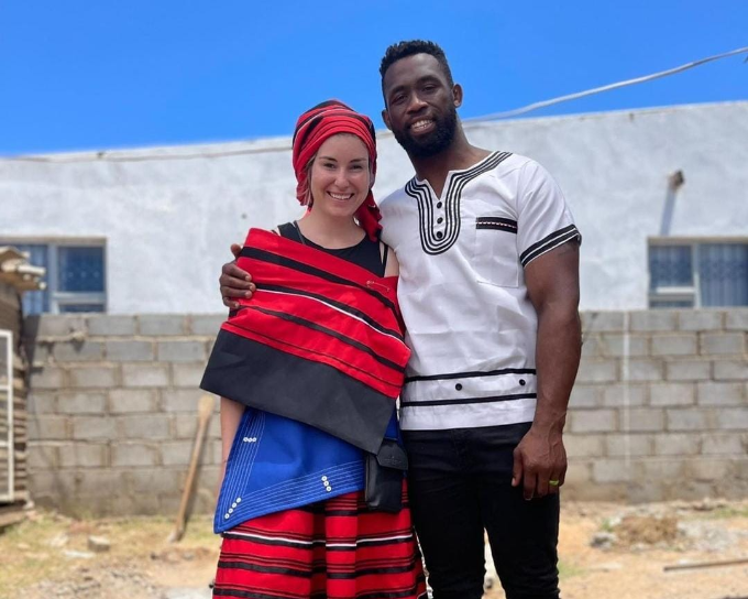 Rachel and Siya Kolisi during a traditional ceremony for his sibling Liyema in 2023.