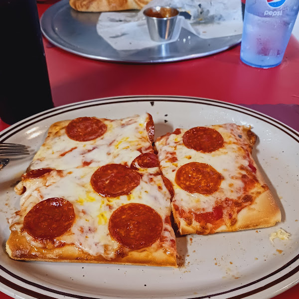 Thick crust Sicilian pizza with pepperoni