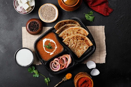 Paneer Pyaaz Paratha With Dal Makhani