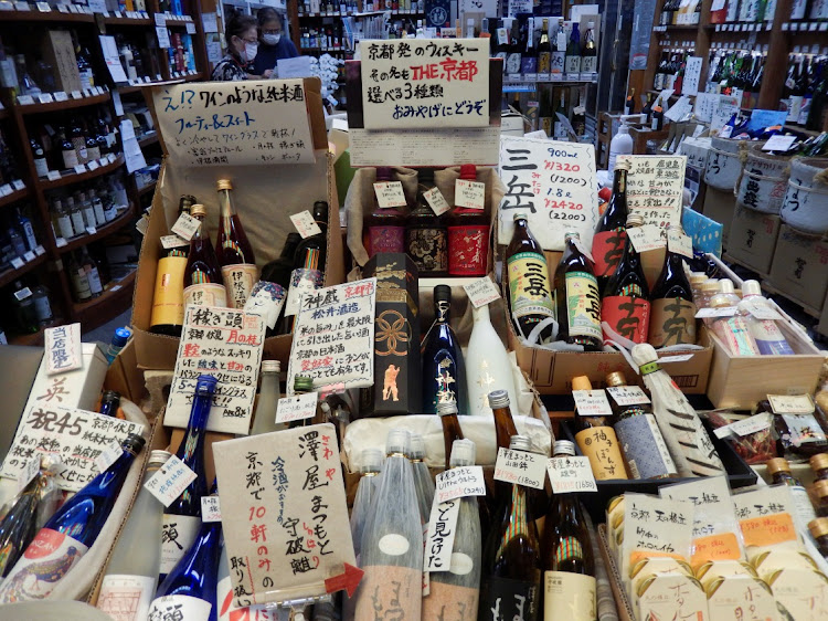 Yasuko Fujii works at her liquor store at Nishiki Market in Kyoto, western Japan, on June 18. Picture: REUTERS/SATOSHI SUGIYAMA