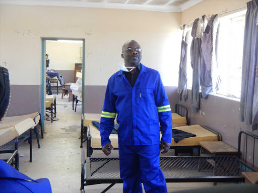 MAN OF MANY TALENTS: Justice Minister Michael Masutha donned a pair of blue overalls and joined offenders and parolees in sprucing up Efata School for the Blind and Deaf in Mthatha yesterday Picture: SIKHO NTSHOBANE