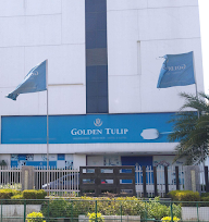 Capers - Golden Tulip Vasundhara Hotel & Suites photo 1