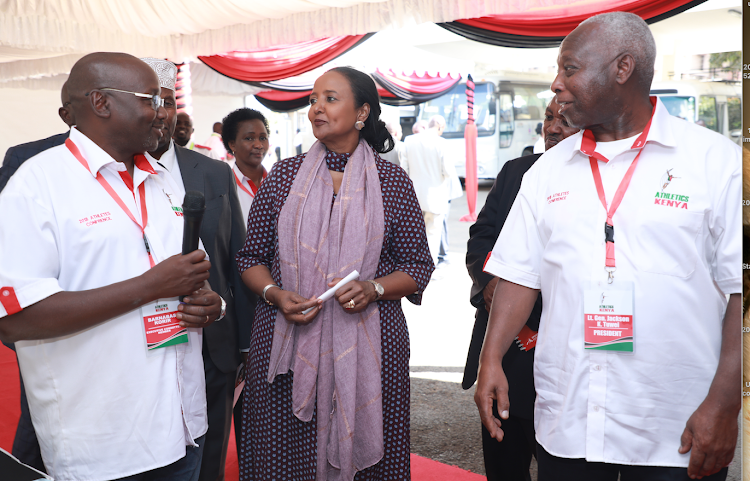 Athletics Kenya President Gen Jack Tuwei and Barnabas Korir with Sports CS Amina Mohamed after her tour of Riadha House