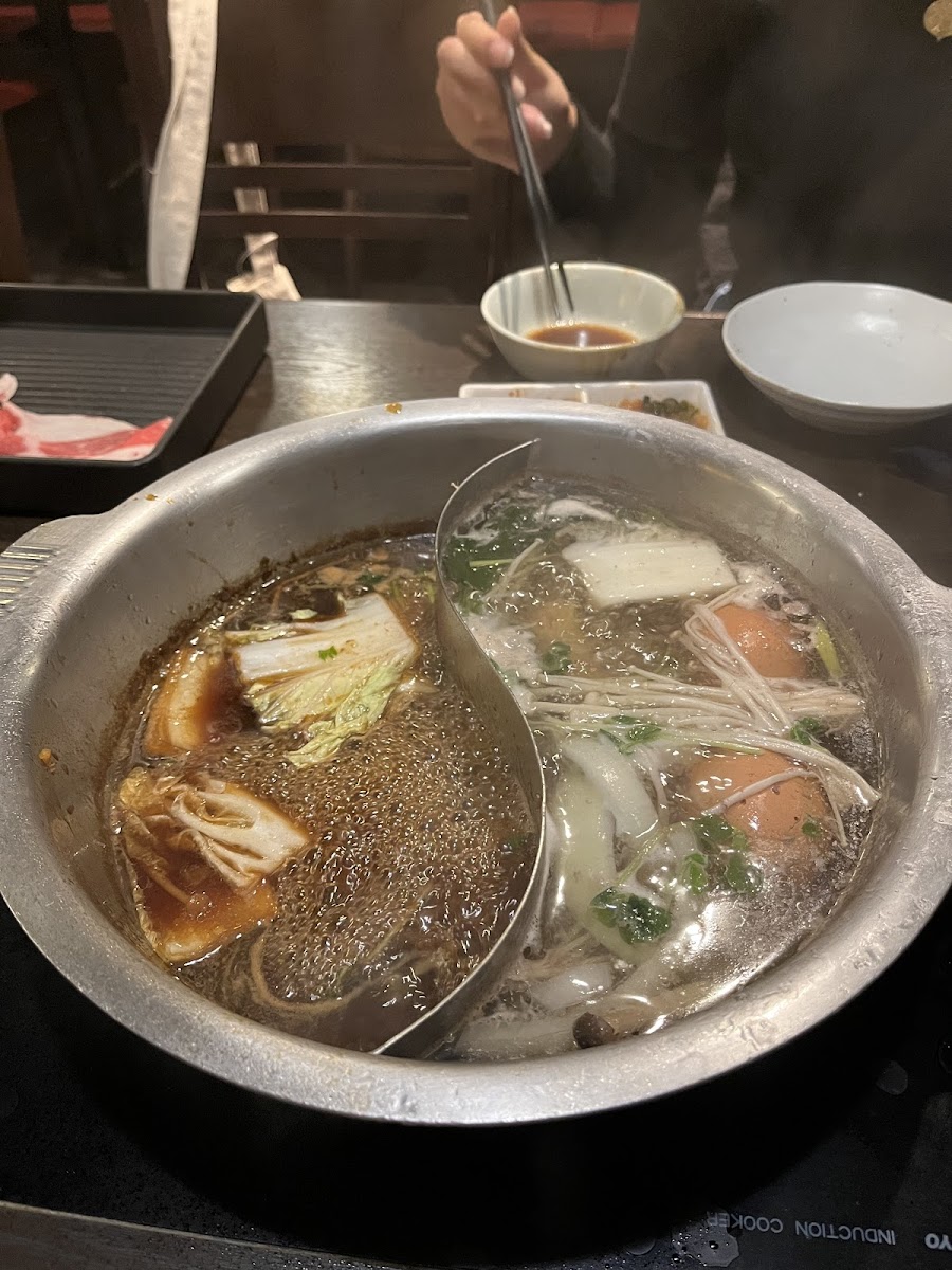 Shabu shabu hotpot (right) and Sukiyaki hotpot (left)