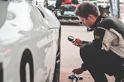 Thomas Falkiner checks the tyre pressures of his GR Supra at the 2020 Emerald Speed Fest. He eventually had to pull out of the event with food poisoning. 