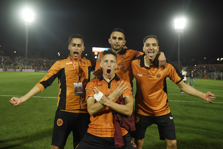 RS Berkane players celebrate victory during the Caf Confederation Cup semifinal second leg match against TP Mazembe at the Municipal de Berkane Stadium in Berkane, Morocco on May 15 2022.