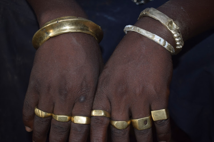 James Muriuki popularly known in Meru as Mabling displays his jewellery