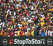 Football fans attend a game in their numbers during the Absa Premiership match between Orlando Pirates and Kaizer Chiefs at the FNB stadium on February 29 2020. This was before the lockdown, which barred fans from stadiums.