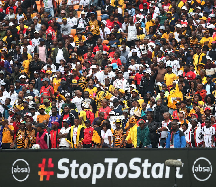 Football fans attend a game in their numbers during the Absa Premiership match between Orlando Pirates and Kaizer Chiefs at the FNB stadium on February 29 2020. This was before the lockdown, which barred fans from stadiums.