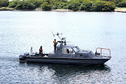 SANDF members at Armed Forces Day in Richard's Bay demostrating water patroling for the preparations of joint forces activities that will commence on Wednesday guarding submarine navy assets in Richard's Bay Small Craft Harbour including the boarding ship.