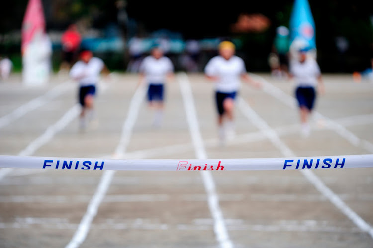 Spectators are allowed to attend school sports events. Stock photo.