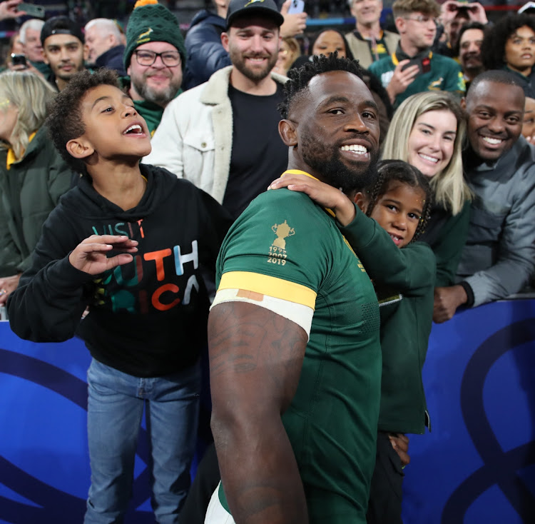 Springbok captain Siya Kolisi with his wife and children at the Rugby World Cup 2023 quarterfinal match against France at Stade de France in Paris on October 15 2023.