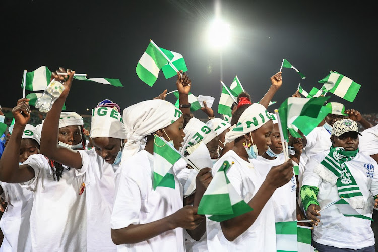 Players from the women's football team in the Minawao refugee camp attend an Africa Cup of Nations (CAN) match between Nigeria and Sudan in Garoua on January 15